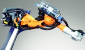 Compact unit: Kuka shelf-mounted robot with the built-in power supply unit